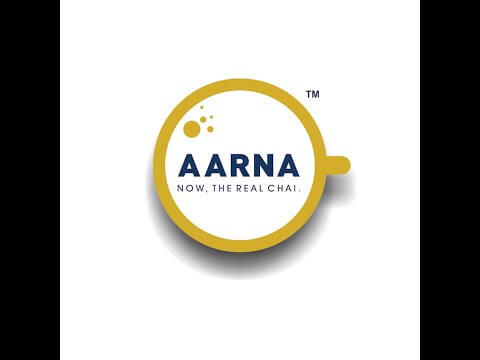 AARNA logo featuring the tagline 'Now, The Real Chai' in a yellow circular design.